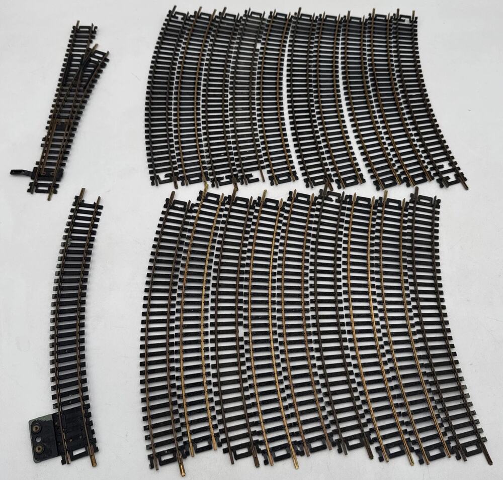 21 Pieces of HO Scale Atlas Curved, Terminal & Switch Train Track Pieces